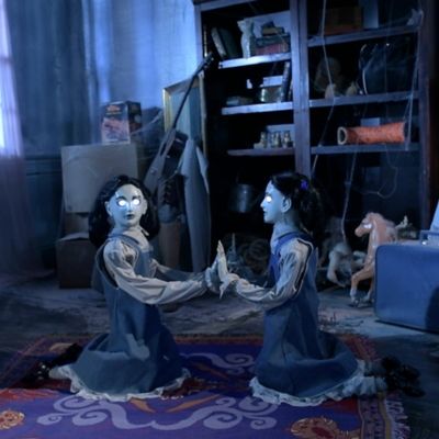 animated demon doll on rocking horse